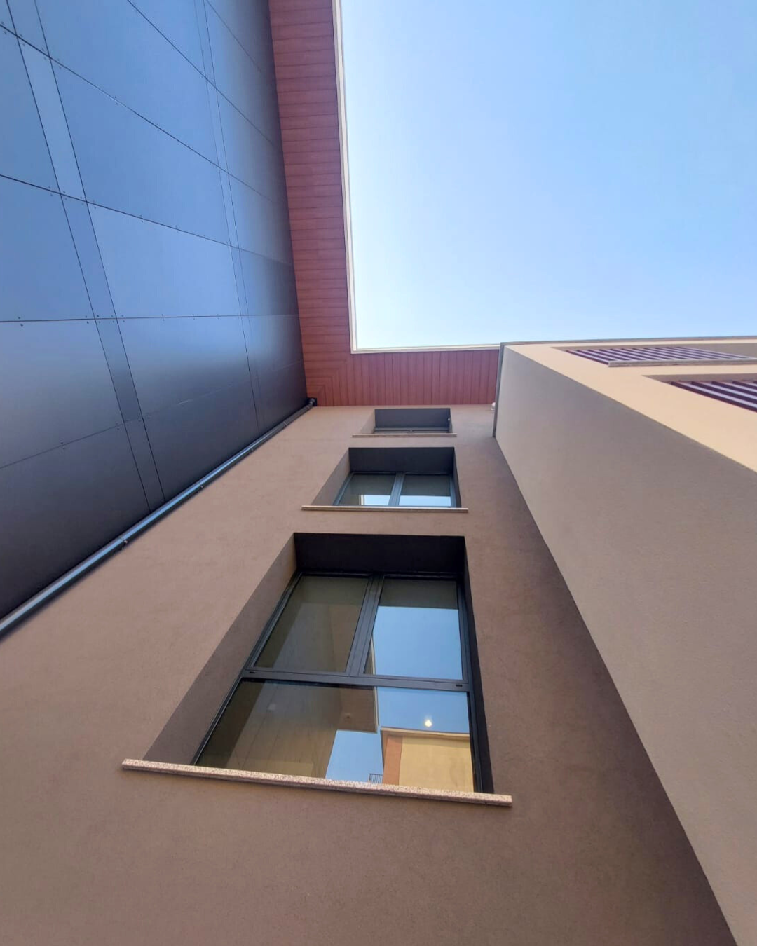 EXTRALUSSO model windows for a residential complex in Cernusco sul Naviglio